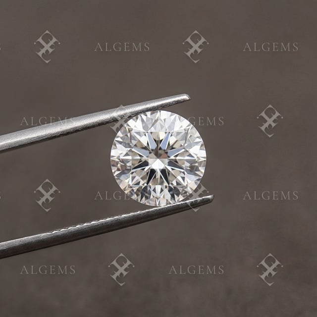 Round brilliant white diamond held between two jeweller tweezer tips against a warm charcoal background